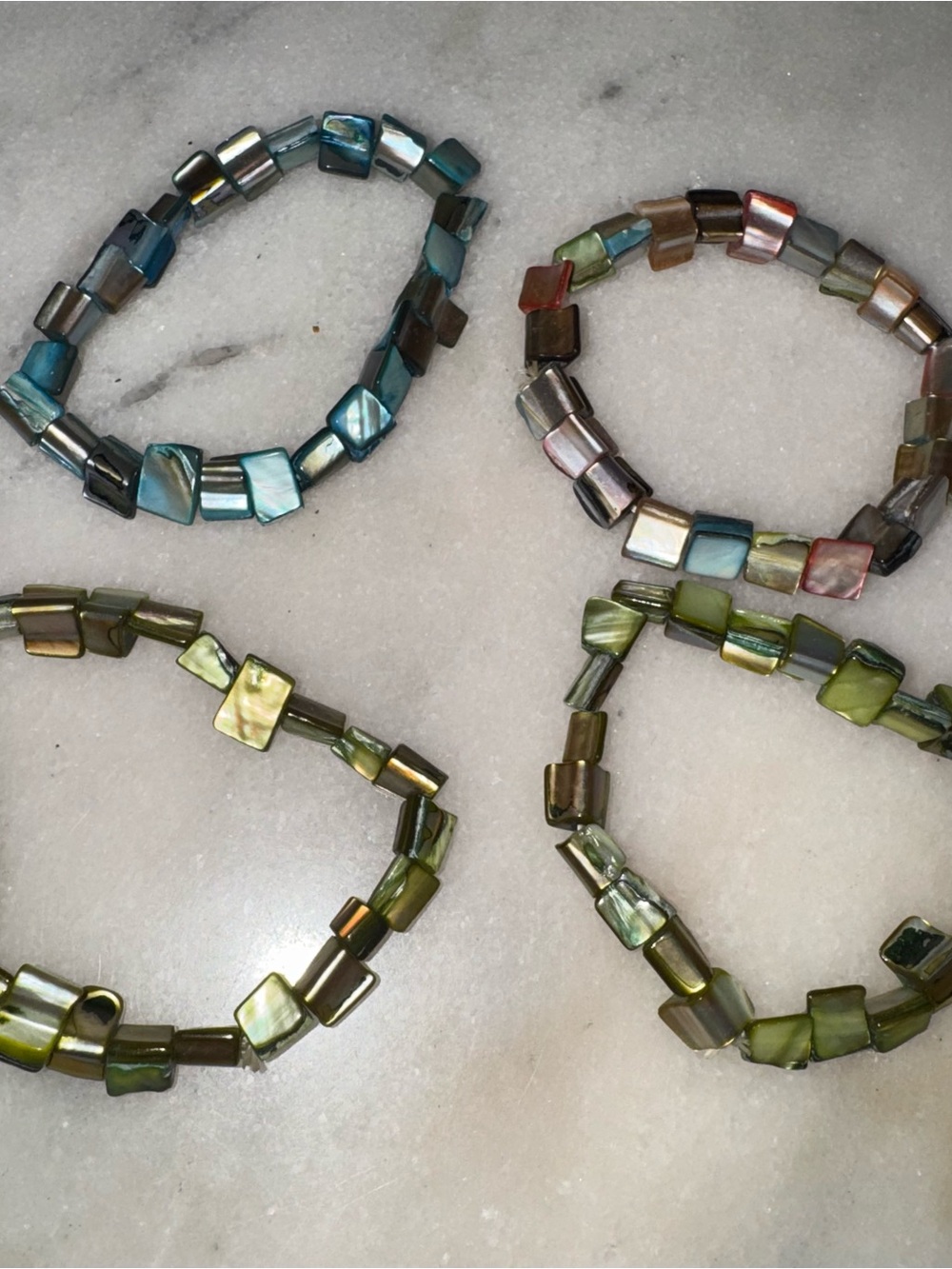 4 iridescent mother of pearl like bead stretch bracelet set